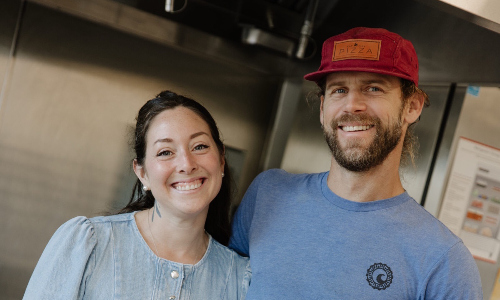 Two Hive Makers smiling in a Hive kitchen