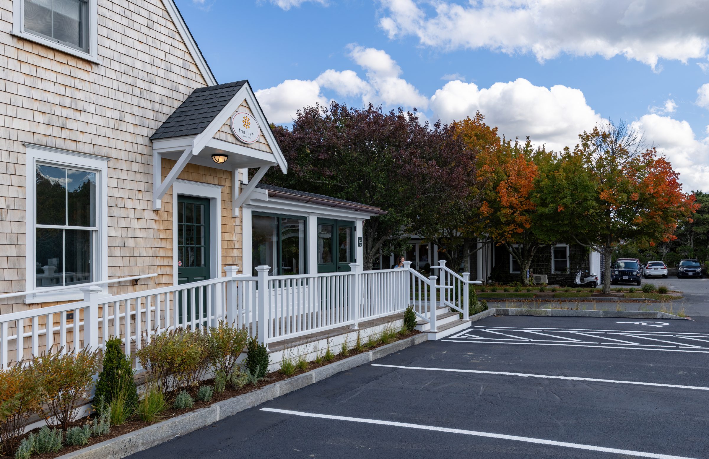 The Hive’s front porch and entrance on Amelia Drive in autumn